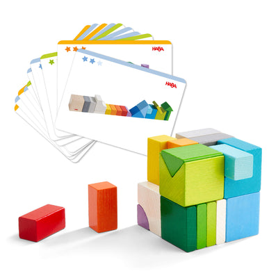 Chromatix 3D Arranging Game colorful wooden blocks next to a stack of template cards with block illustrations.