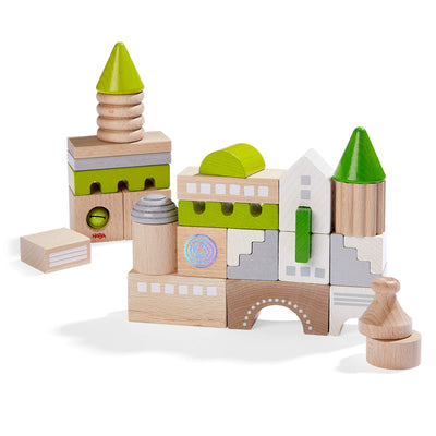 Coburg Wooden Building Blocks assembled into a structure with varied shapes and colors.