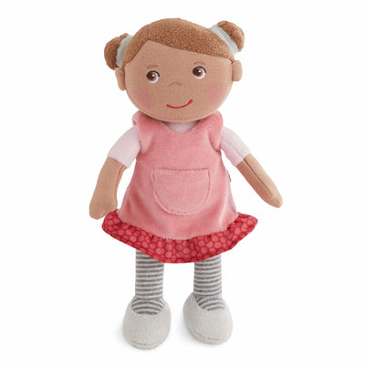 Snug Up Camila plush doll with a pink dress, striped leggings, and brown hair in buns.