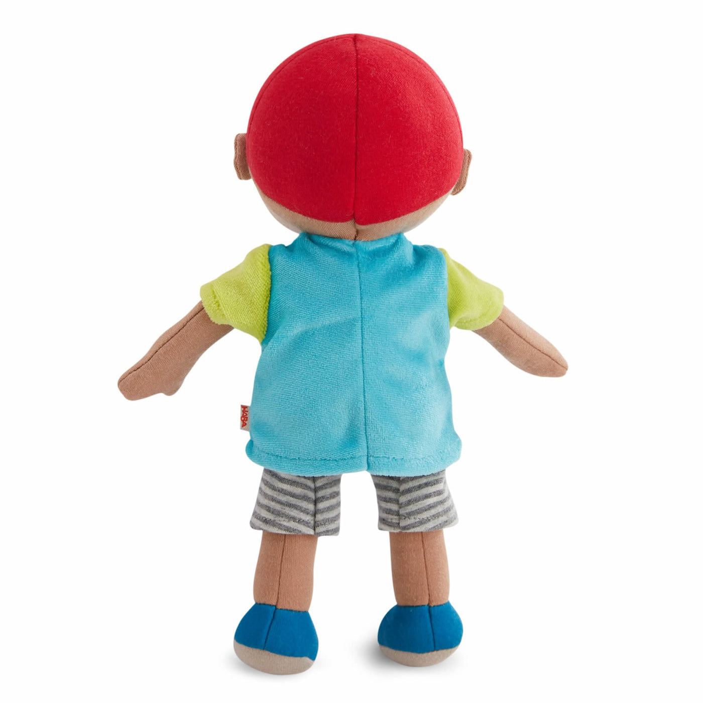 Back of Snug Up Gabriel plush doll wearing a red cap, blue top, gray striped shorts, and blue shoes.