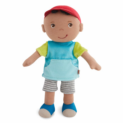 Snug Up Gabriel plush doll wearing a red cap, blue top, gray striped shorts, and blue shoes.