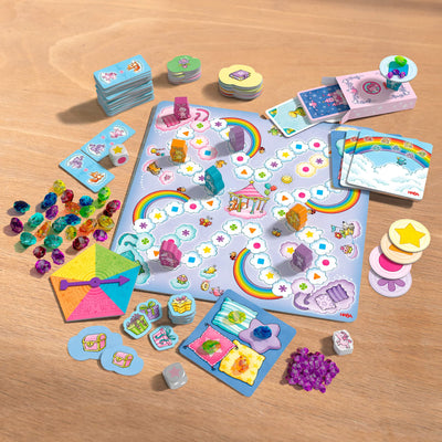 HABA Unicorn Glitterluck game with gameboard, wooden game pieces, cardboard game pieces, cards, a spinner, dice, multicolored jewels