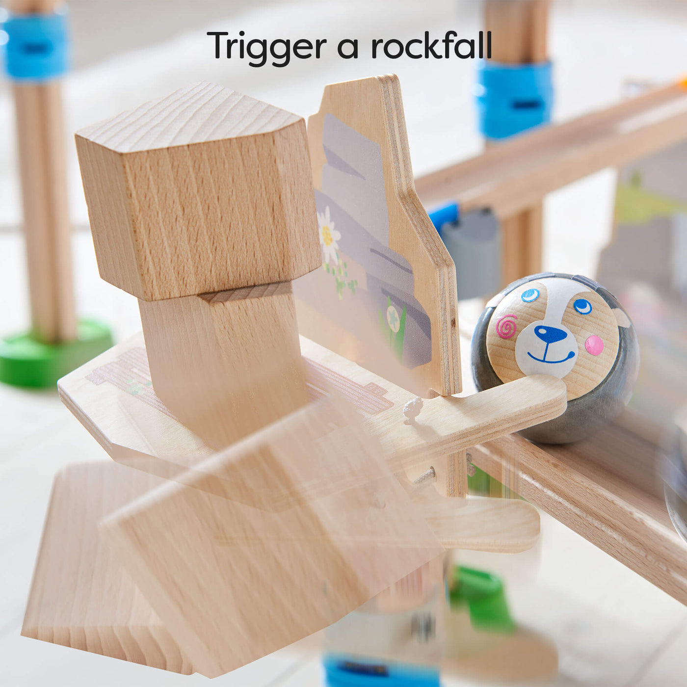 Trigger a rockfall with the wooden ball