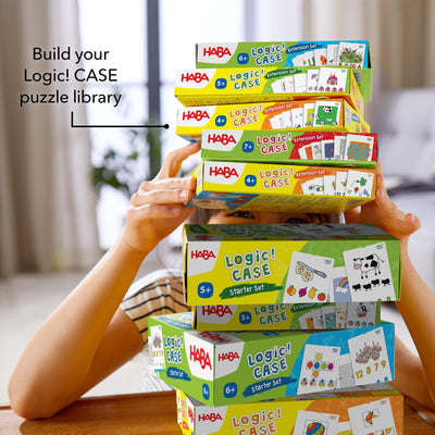 Build your Logic! CASE puzzle library! Girl peeking from behind stack of Logic! CASE puzzle boxes