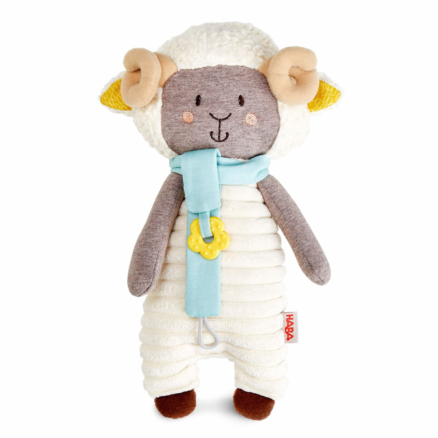 Woolbert the Ram plush with a gray head, beige horns, a white fluffy body, and a blue scarf with a yellow teether ring.