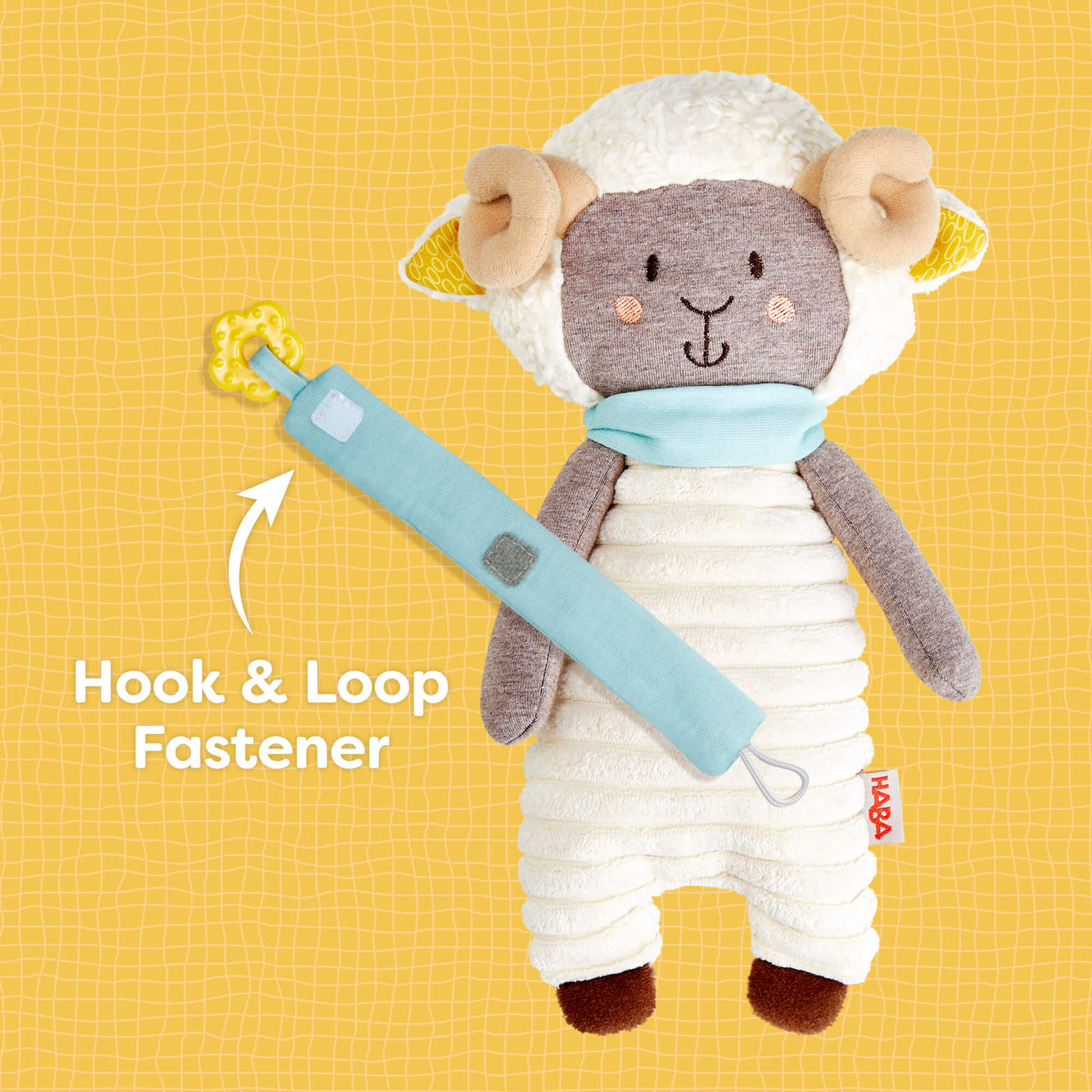 Woolbert the Ram's scarf has a hook and loop fastener