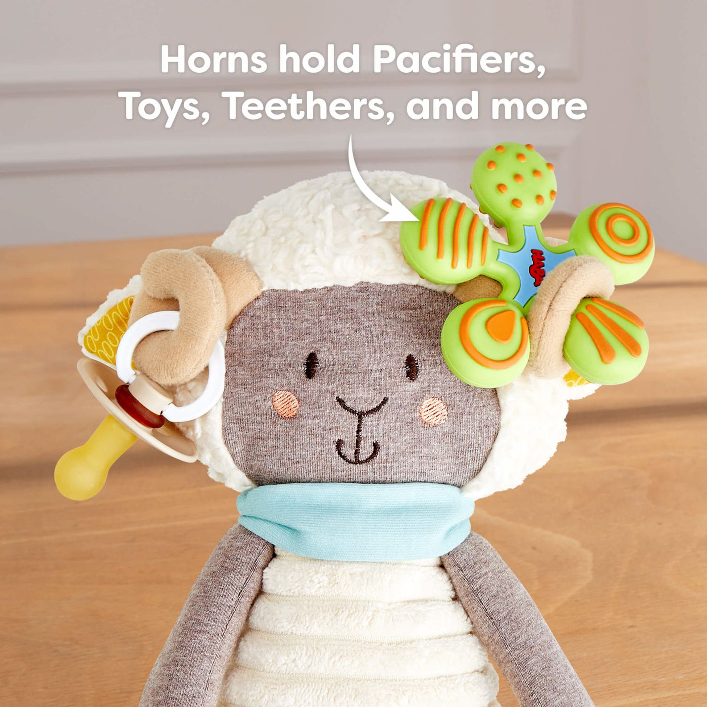 Woolbert the Ram's horns hold pacifiers, toys, teethers, and more